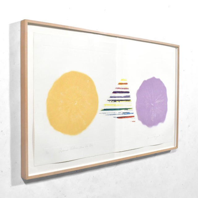 This print by important American artist James Rosenquist (b. 1933) is titled "Pyramid Between Two Dry Lakes". It is an...