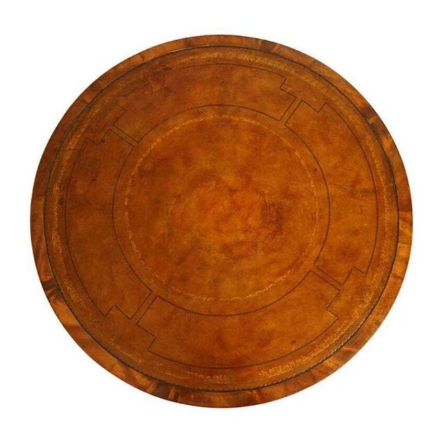 Lovely regency style revolving bookcase drum table with a whiskey brown hand-dyed leather top. A very well-made and solid...