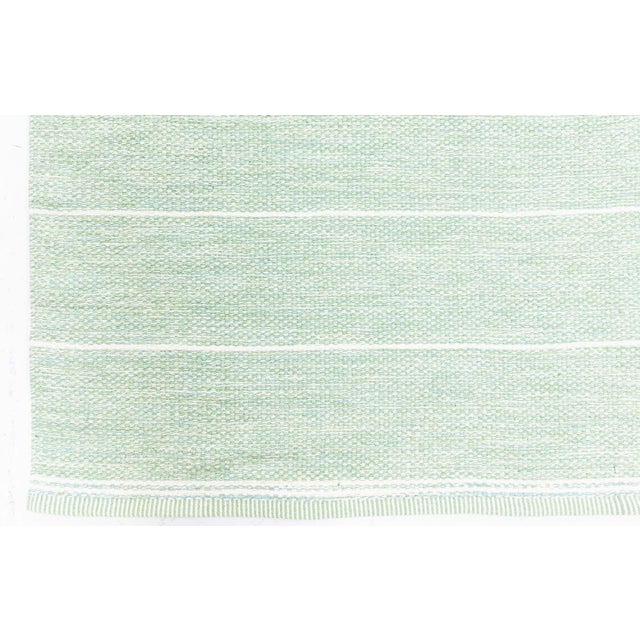 Vintage Swedish Green Flat Woven Rug Size: 6'1" × 10'0" (185 × 304 cm) This vintage Swedish flat-weave rug showcases a...