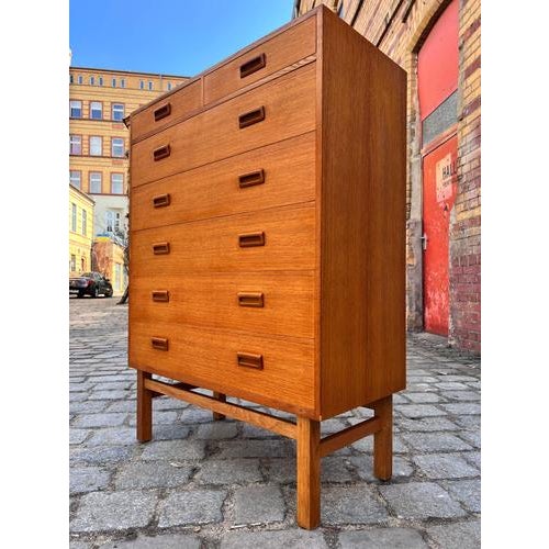 This Tallboy chest of drawers by Holger Jensen for FDB Møbler is an outstanding example of Danish design from the 1960s....