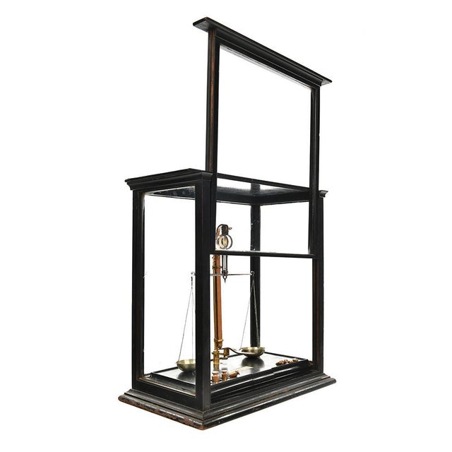 Petite balance anglaise sous vitrine This piece is designed in the style of the selected designer and/or manufacturer