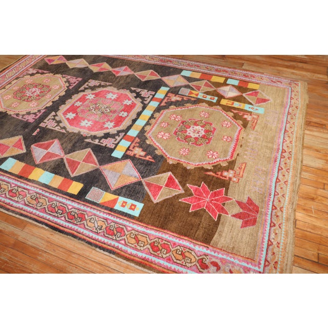 One-of-a-kind Turkish Kars rug with a combination of funky colors and motifs. Dated 1989 Measures: 7'1" x 10'1".