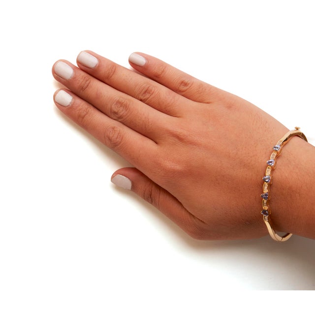 Early 21st Century 14K Yellow Gold Alternating Trillion Tanzanite and 1/3 Cttw Diamond Bangle Bracelet - Size 7" For Sale - Image 5 of 6