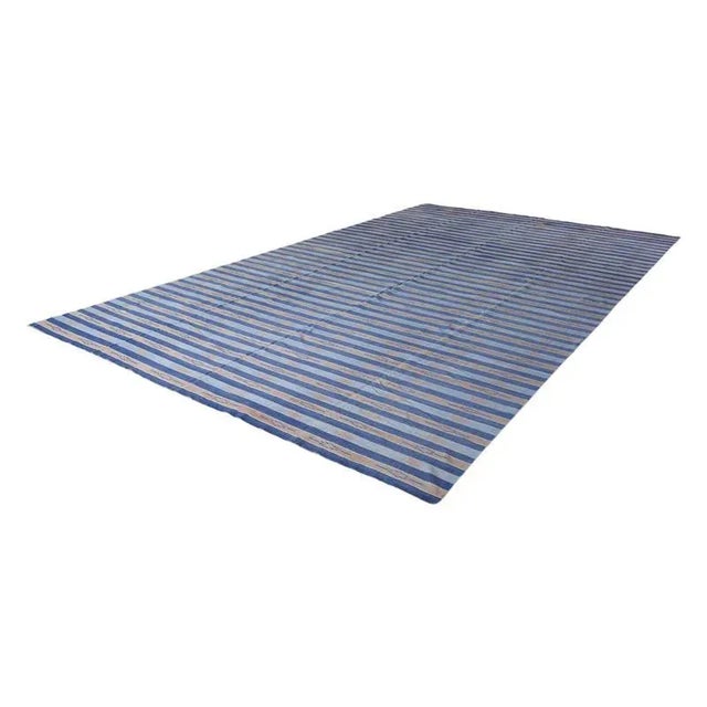 This 10x17 vintage Dhurrie rug is an exciting new curation from Rug & Kilim’s latest acquisition of rare and exemplary...