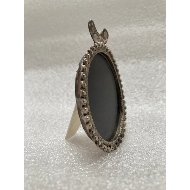 This elegant mini picture frame features a beautiful floral pearl pattern and a classic transitional style, perfect for...