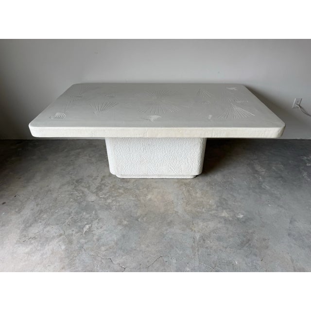 A striking 1980s handmade plaster dining or conference table in the style of J. Berdou, known for his sculptural and...