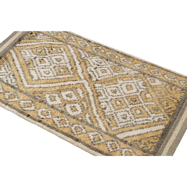 Hand-knotted in wool and silk, this 2x4 Moroccan rug features a ribbed texture inspired from Boucherouite-style pieces and...