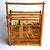 Offered is a vintage 1960s Paul Frankl style handled bamboo magazine rack with two compartments. It features bamboo wood...