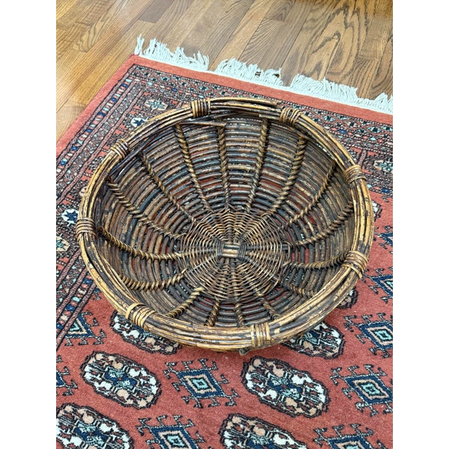 We love this big & sturdy, round wicker and rattan basket. The dark brown with tan color makes it more unusual. Great...