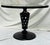recently restored center table. can float stand alone or be flanked by chairs for cocktails or appetizers. heavy iron with...