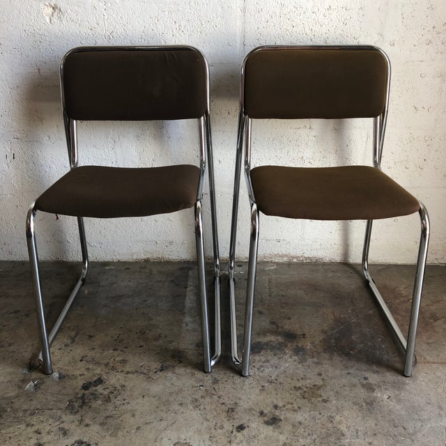 A pair of Vintage 1970s Italian Chrome chairs by The Otto Gerdau Company. Feature a Clean Utilitarian Minimalist design...