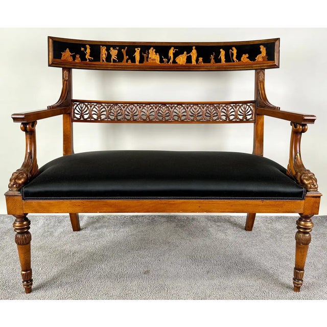 An elegant Italian Neoclassical style settee featuring intricate carving details. The top part of the backrest is...