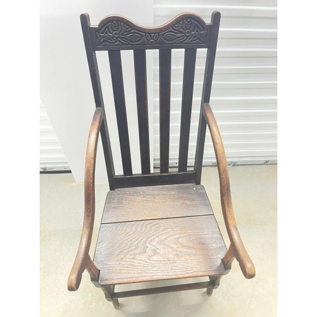 Antique Jacobean oak side chair with custom seat cushion. Simple design with narraw seat. could also be used as a desk chair.