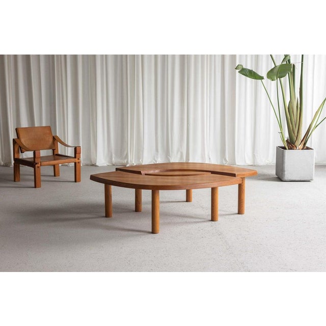 Presenting an iconic coffee table, the “t22,” designed by pierre chapo and crafted in his atelier in gordes, france,...