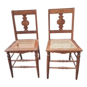 A Pair of Late Victorian Walnut Inlays and Cane Seat Side Chairs