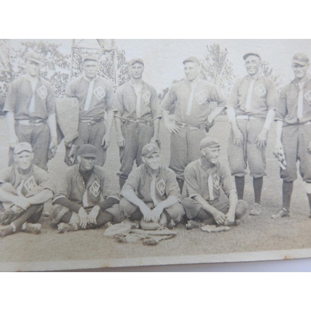 Early 20th century sepia tone group portrait snapshot photograph of baseball team. Don't know the team, they have a W...