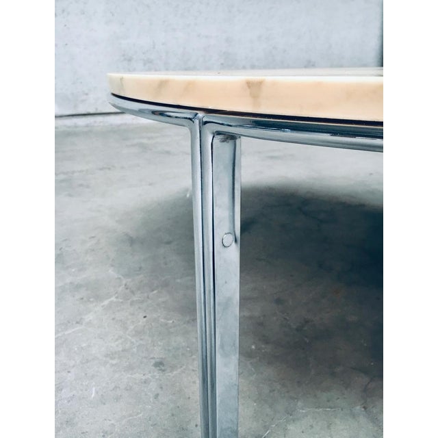 Vintage Mid-Century Modern Italian design marble coffee table. Made in Italy, 1960s / 70s. Round marble top on chromed...