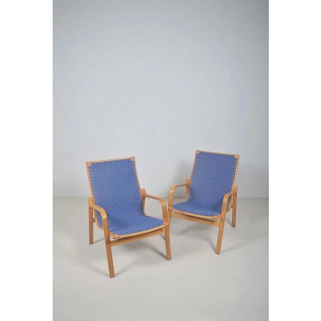 Set of 2 Danish armchairs 'Model Line' designed by Finn Østergaard. These seats from the 1970s were manufactured by the...