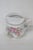 This gorgeous Shaving Mug is made of porcelain. This lovely shaving mug has a gorgeous motif of pink and purple flowers on...