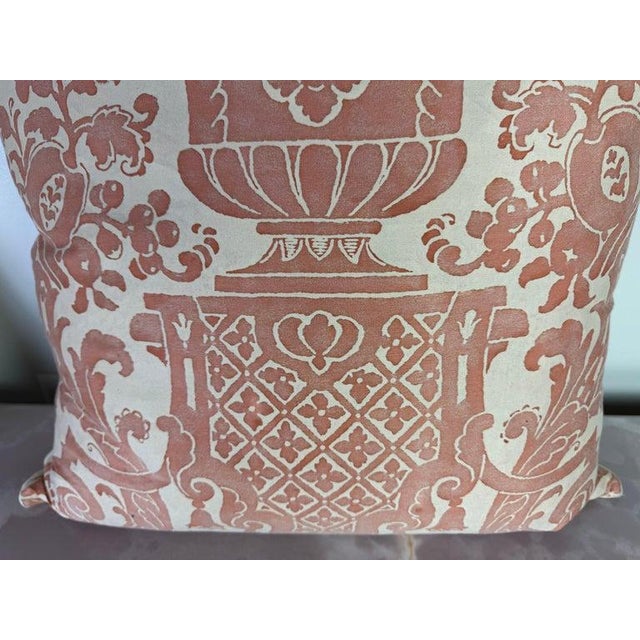 An elegant pair of decorative pillows crafted from authentic Fortuny textile, featuring a refined neoclassical urn-and-...