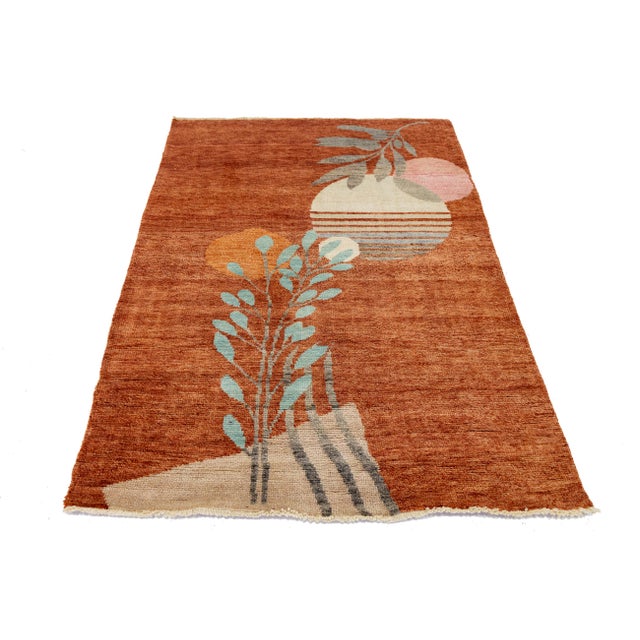 Elevate your space with this 4x6 Art Deco-inspired area rug, featuring a blend of geometric shapes and botanical motifs....