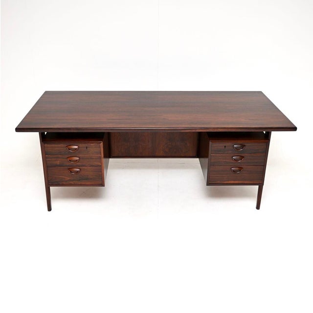 A magnificent and very large vintage Danish desk, dating from the 1960’s. It is of outstanding quality, this is the very...