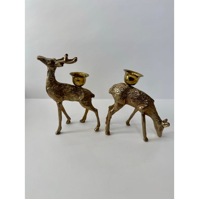 Infuse your home with a touch of mid-century whimsy and musical flair. This curated five-piece set of solid brass candle...