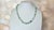 A striking and timeless vintage necklace composed of natural Burmese jadeite jade beads, dating to approximately the...