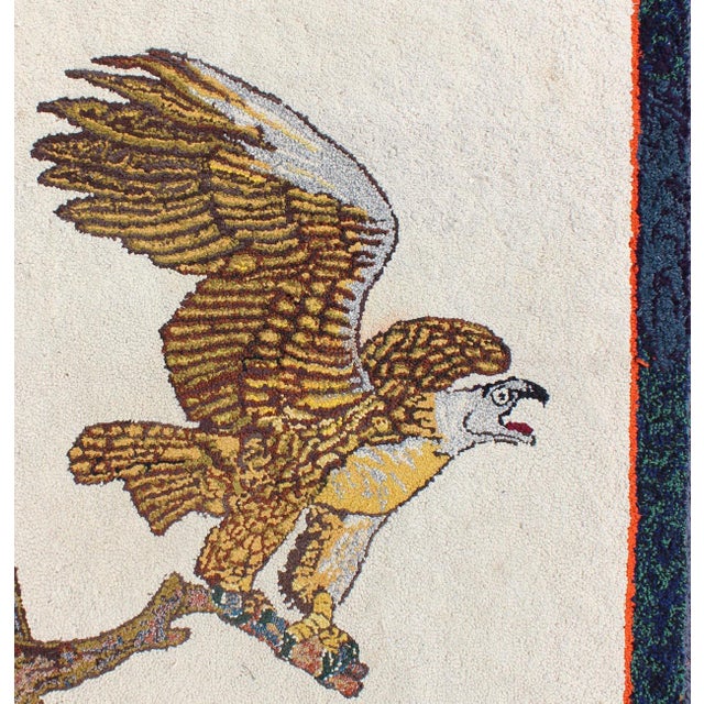 Measures:2'7 x 3'1 Creams and Gold, tan antique American hooked rug with a bald eagle on a tree. Keivan Woven Arts / rug...