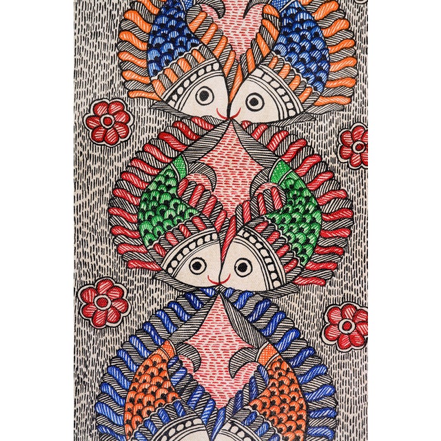 An intricate example of traditional Indian Madhubani folk art, this hand-painted composition by Mamta Devi celebrates the...