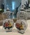 These are a vintage Pair of Chinese moon flasks from the mid-20th century. They feature a beautiful, colorful floral...