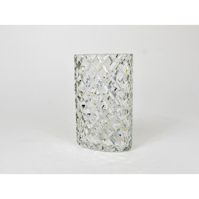A beautiful oval facetted crystal glass vase from the 1970s, designed and executed by Claus Josef Riedel in Austria....