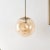 Modern Cyril 10" Organic Sphere Pendant in Amber/Brass For Sale - Image 3 of 5
