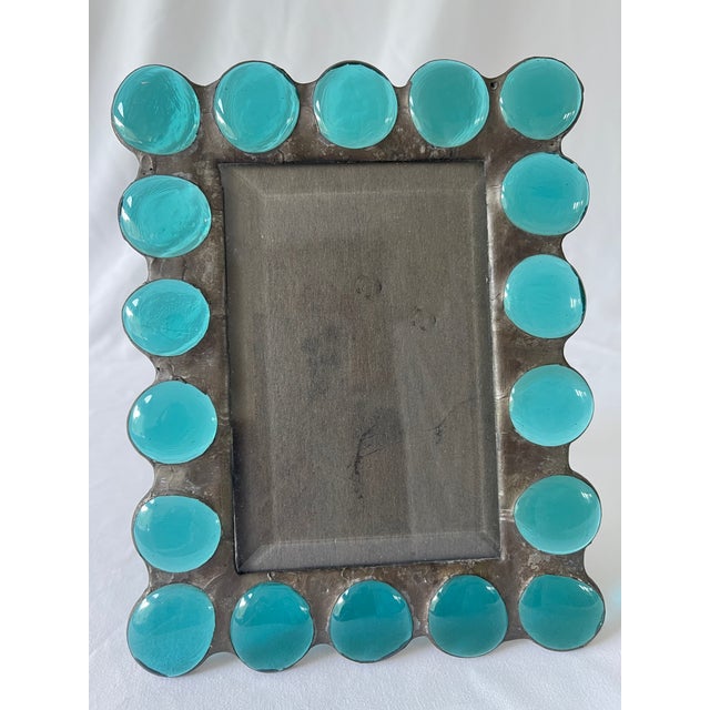 Turquoise round glass jewels set in pewter picture frame. Folding frame stand and black velvet backing. Fits 4" x 6" photo...