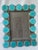 Turquoise round glass jewels set in pewter picture frame. Folding frame stand and black velvet backing. Fits 4" x 6" photo...