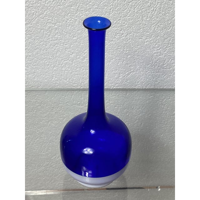 Murano glass carafe. Venini Murano label on the bottom of the carafe. Two-tone, its base is opaque white, the rest of the...