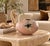 Striking 1986 studio pottery vase by Richard Mahaffey, featuring a sculptural rounded form with a small circular opening....