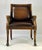 Wood Pair of Theodore Alexander Regency Style Carved Lion & Hairy Paw Caster Armchairs in Brown Leather For Sale - Image 7 of 17