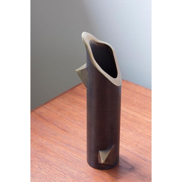 Heavy bronze vase produced in sweden by ekbergs during the 1960-70s. Whimsical and original design with biomorphic opening...