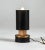 Table lamp working with black painted metal and copper. Italy 1970 with evident signs of the time. Measures: Diam 8 x h...