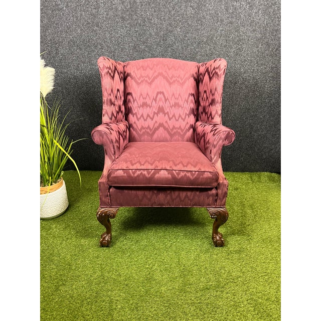 Bring classic old-world elegance to your space with this stately traditional wingback lounge chair, custom-built by the...