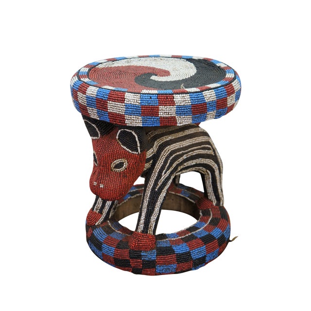 Vintage beaded nobility throne stool / side table / plant stand from the Bamileke tribe of Cameroon. It is constructed...