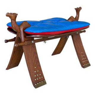 Vintage Carved Boho Camel Saddle Stool or Ottoman With Brass Studded Legs For Sale