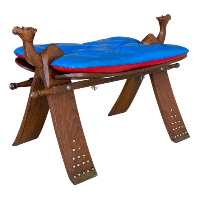 Vintage Carved Boho Camel Saddle Stool or Ottoman With Brass Studded Legs For Sale