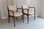 Danish Modern Teak Armchairs, 1950s. Set of 2. Pair of elegant and organic Scandinavian Mid-Century Modern armchairs made...