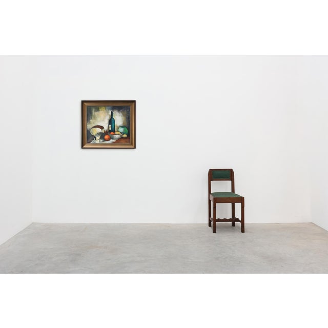 A striking mid‑century belgian still life by a. De man, painted around 1960 in oil on canvas. The composition features a...