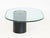 Karl Springer Attributed Oval Glass Coffee Table, the geometric frosted glass top above oval gold-leaf and black resin...