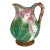 A George Jones Majolica Baluster-Form Pitcher, the body with relief-molded chestnut leaves and blossoms on a deep pink-...