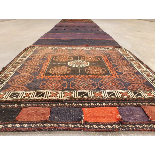 Originaly used as a saddle bag to carry salt. It is now been opened up to serve as a rare and unique nomadic runner. 100%...