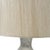 This transitional-style glass table lamp is sure to elevate the style of any space. It features a bottle-shaped base, a...